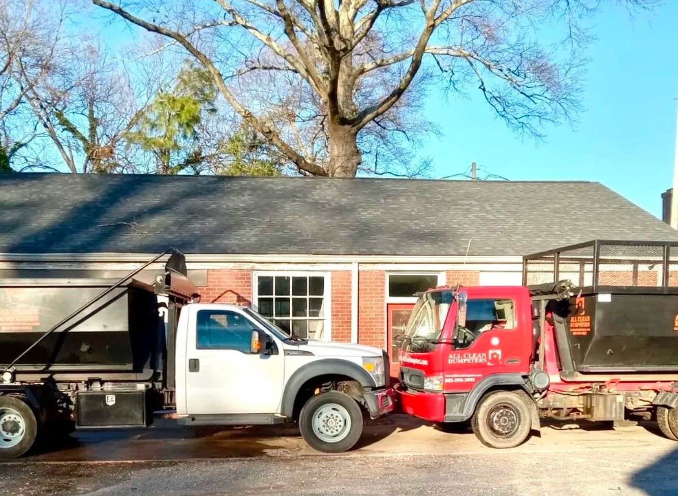 A truck is parked in front of a house.